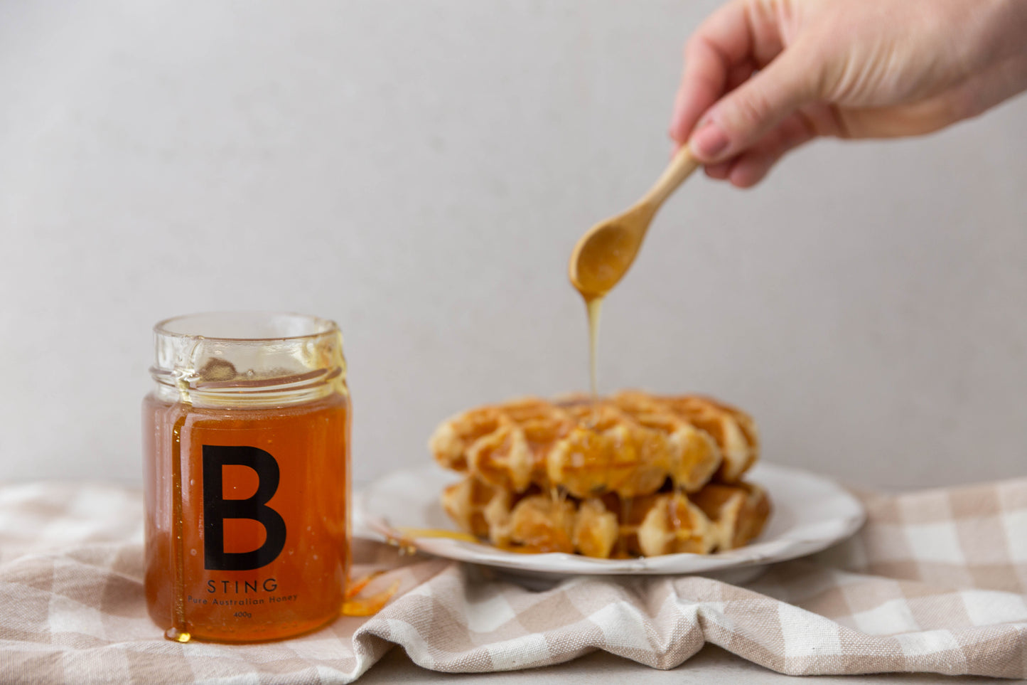 Pure honey. Raw honey. Unfiltered honey. South Australian honey. Fleurieu peninsular honey. Adelaide Hills honey. Local honey. B Sting Apiaries. Bulk honey. Cooking honey. Baking honey. Gifting honey. Wedding honey gift. Corporate honey. Cheese platter honey. Charcutery board honey. Cheese with honey. Honey drizzle. Waffles with honey.
