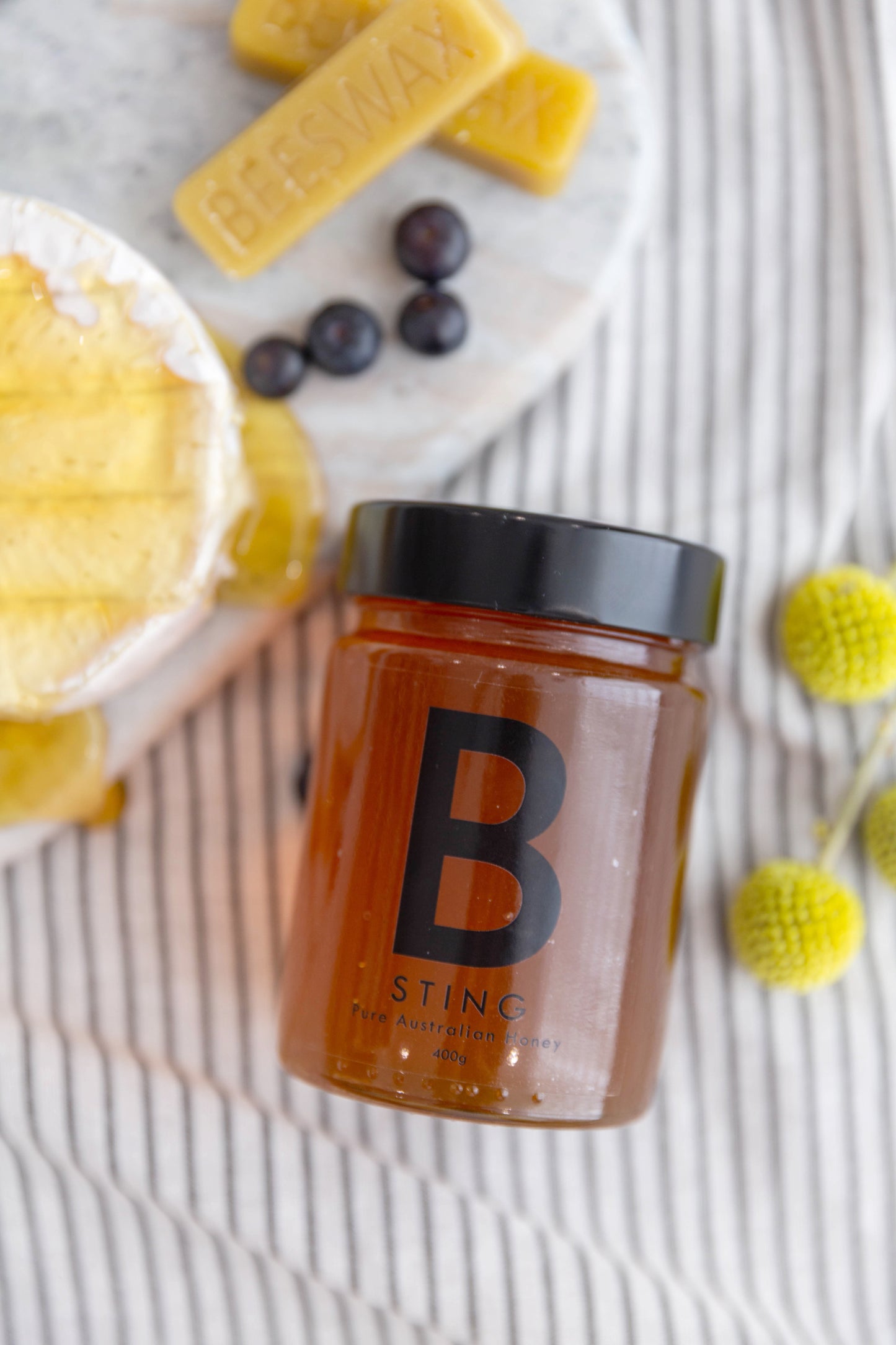 Pure honey. Raw honey. Unfiltered honey. South Australian honey. Fleurieu peninsular honey. Adelaide Hills honey. Local honey. B Sting Apiaries. Bulk honey. Cooking honey. Baking honey. Gifting honey. Wedding honey gift. Corporate honey. Cheese platter honey. Charcutery board honey. Cheese with honey. 