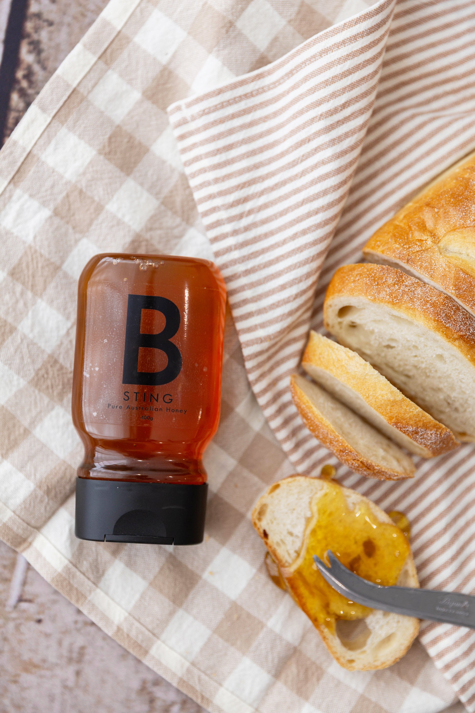 Pure honey. Raw honey. Unfiltered honey. South Australian honey. Fleurieu peninsular honey. Adelaide Hills honey. Local honey. B Sting Apiaries. Bulk honey. Cooking honey. Baking honey. Squeeze honey bottle. Family honey.